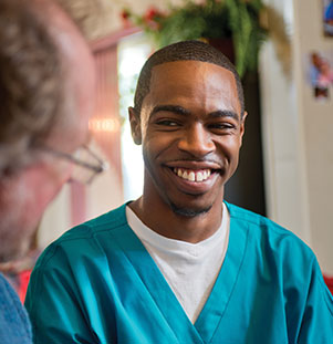 Guy Smiling during treatment with Elite Home Health